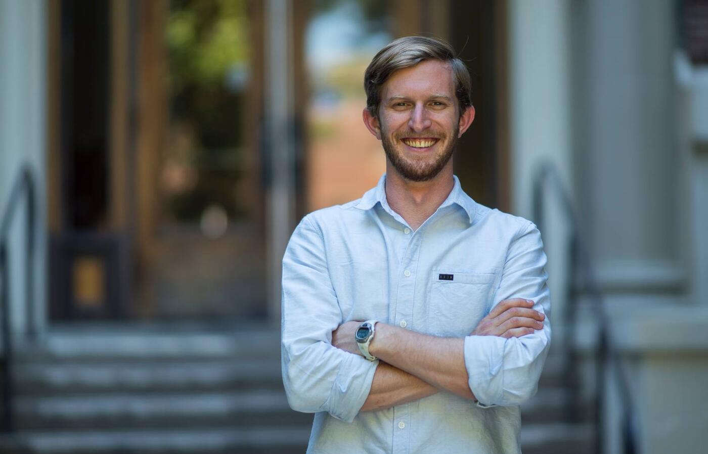 Daniel Watson standing in front of a building at OSU
