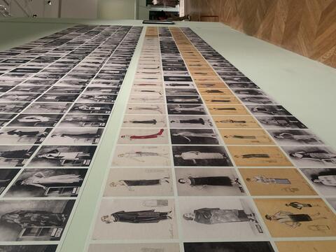 a wall covered in fashion sketches